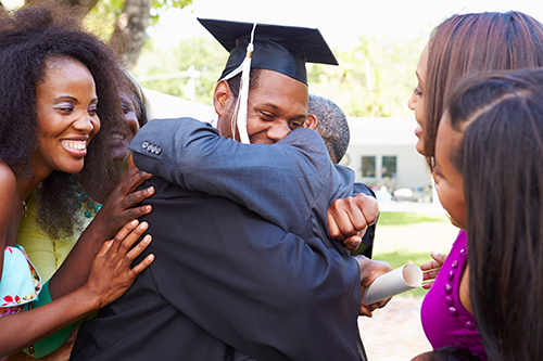 Family hug from son graduation